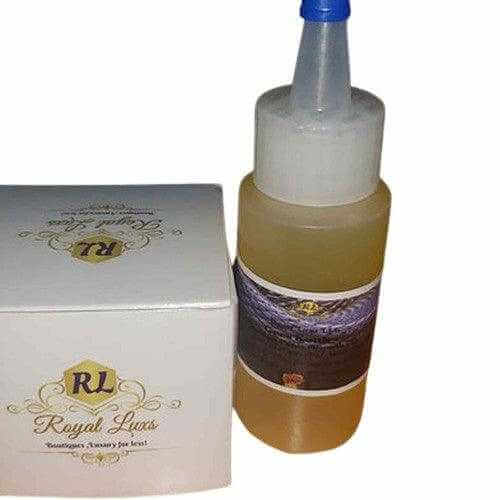 RoyalLuxsLLC herbal body oil set with two-tone liquid in clear plastic bottle and branded white box