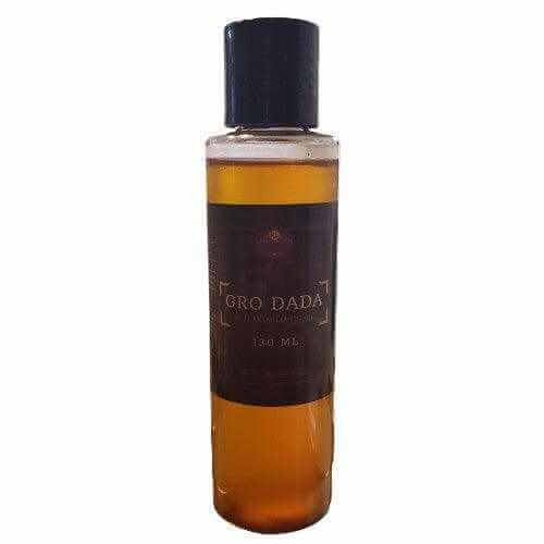 RoyalLuxsLLC Gro Dada botanical body nourishment oil in clear bottle with black cap